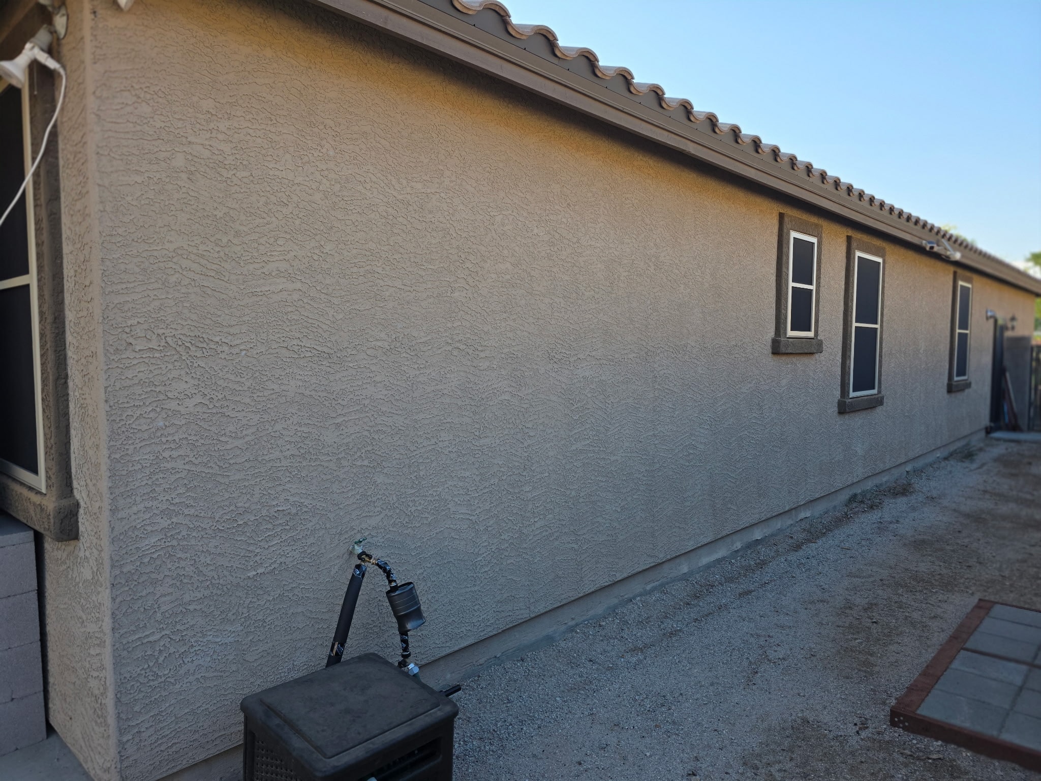 Example outside wall photo — stand back to show the exterior and surrounding area