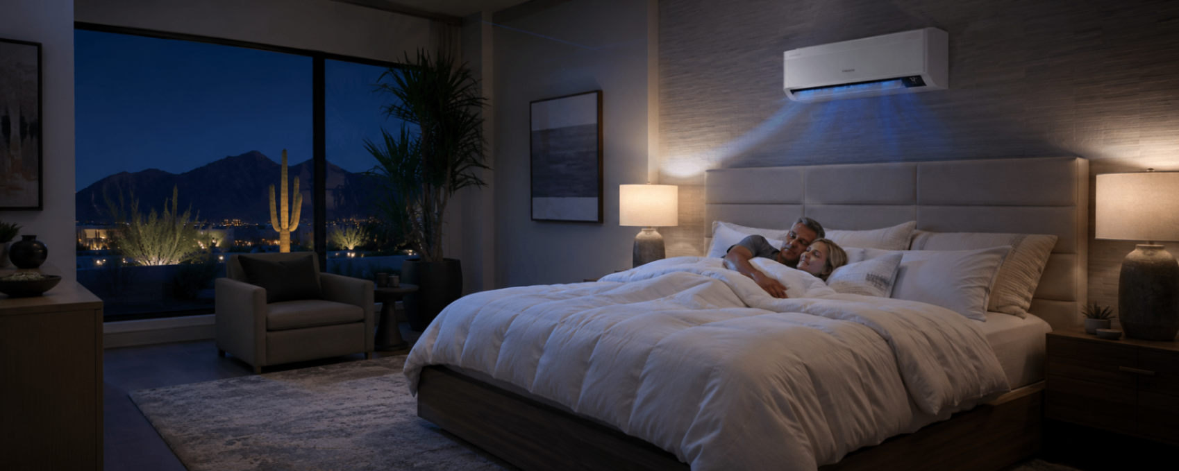 Samsung Wind Free mini split in Wind Free mode — couple sleeping comfortably in Arizona bedroom with blue cold fog airflow